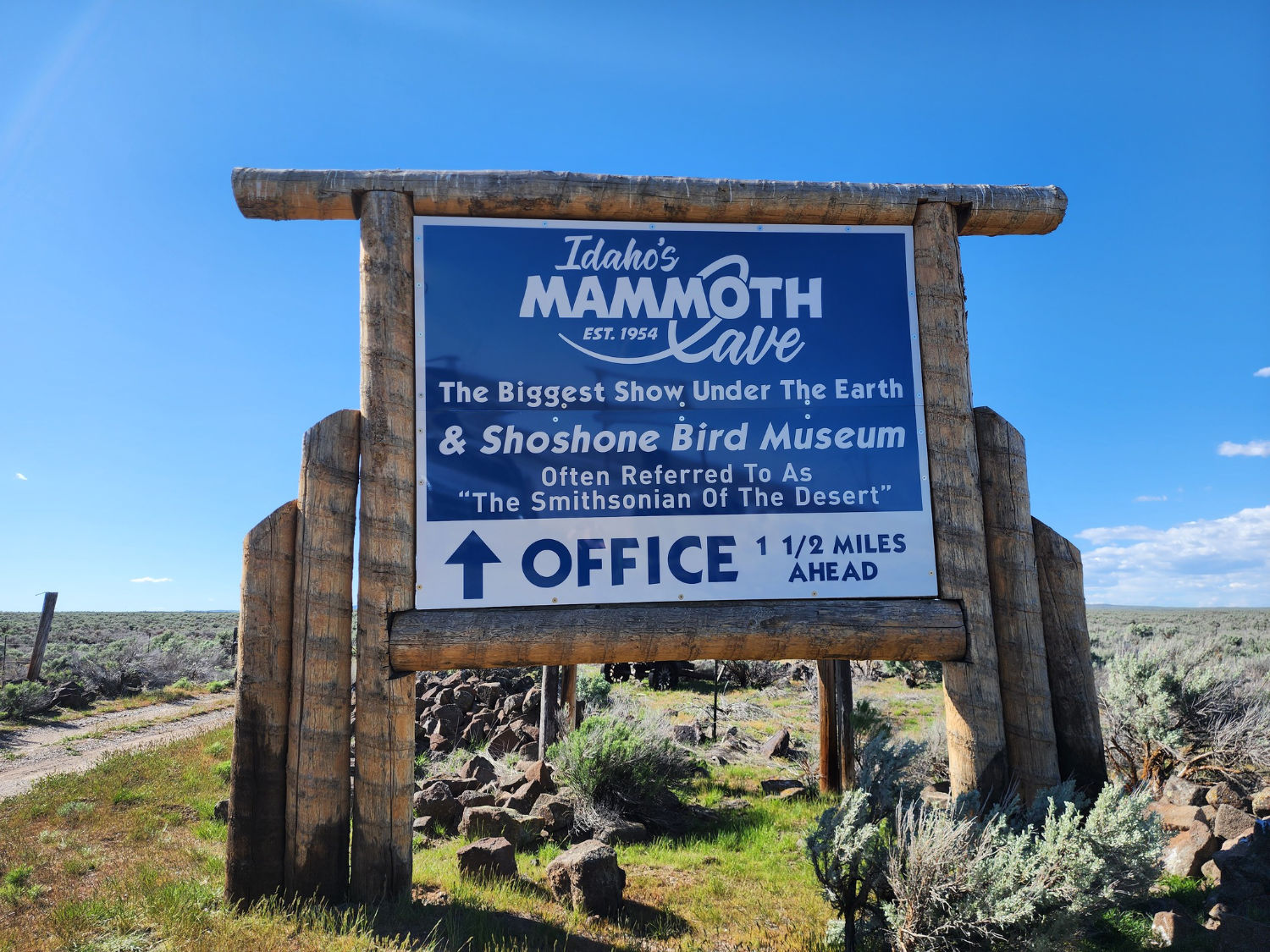 Roadside sign for Idaho’s Mammoth Cave and Shoshone Bird Museum in the Idaho desert near Shoshone Idaho