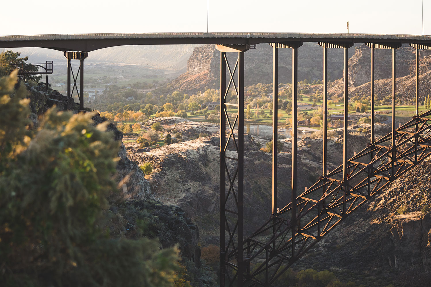 Ziplining across the Snake River Canyon in Twin Falls Idaho with views of canyon cliffs and river below