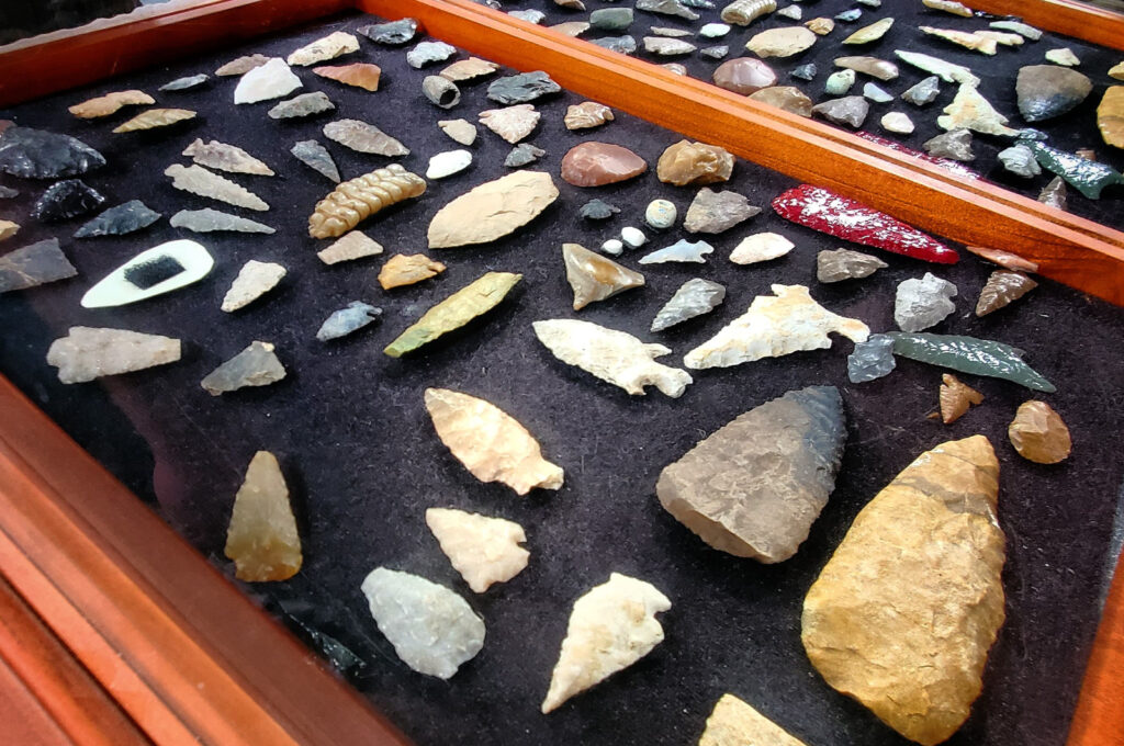 Native American arrowheads and stone artifacts displayed at the Shoshone Bird Museum of Natural History at Idaho’s Mammoth Cave