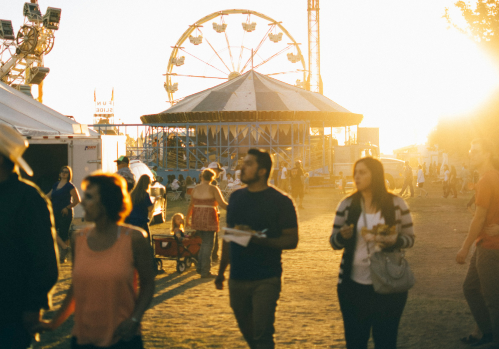 county-fair-sunset-crowd-rides