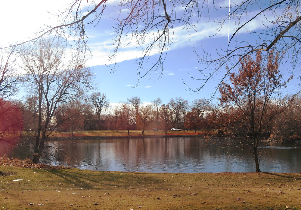 Julia Davis Park in Boise Idaho with pond, trees, and fall colors in city park setting