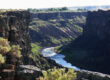 Malad Gorge State Park in Idaho featuring a deep canyon with the Snake River flowing through rugged cliffs