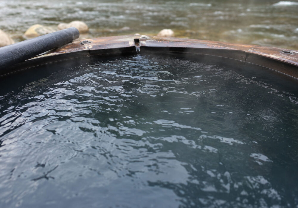 boat-box-hot-springs-water-surface-stanley-idaho Close-up view of the water surface inside Boat Box Hot Springs beside the Salmon River near Stanley, Idaho